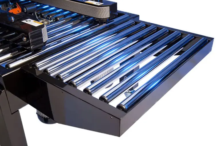 Conveyor roller system with metal rollers.