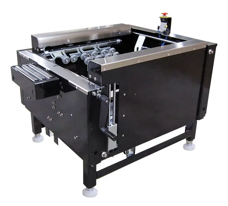 Industrial black and silver packaging machine.
