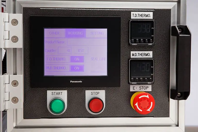 Control panel with buttons and temperature displays.