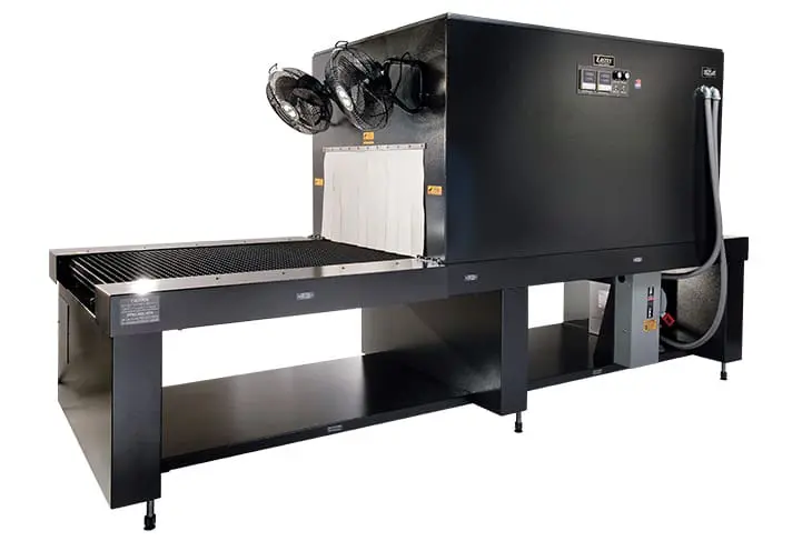Industrial conveyor oven with cooling fans.