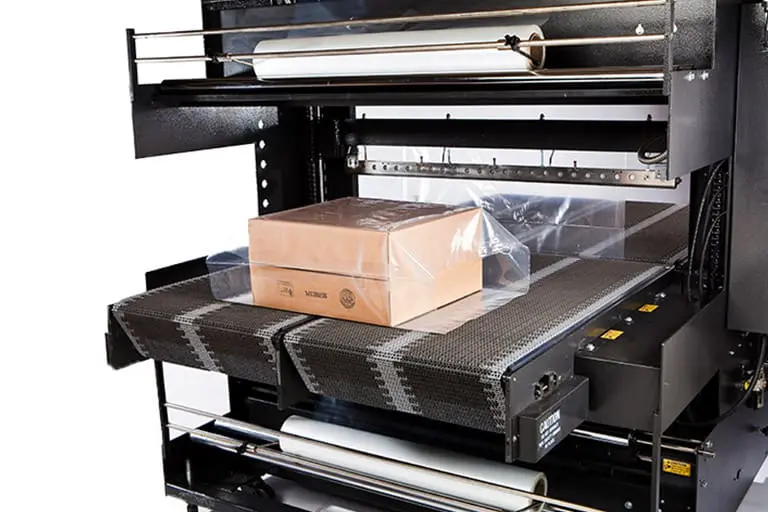 Box on conveyor in packaging machine. Box on conveyor in packaging machine.