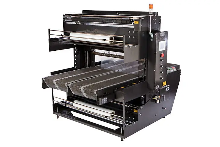 Industrial printing machine with multiple rollers.