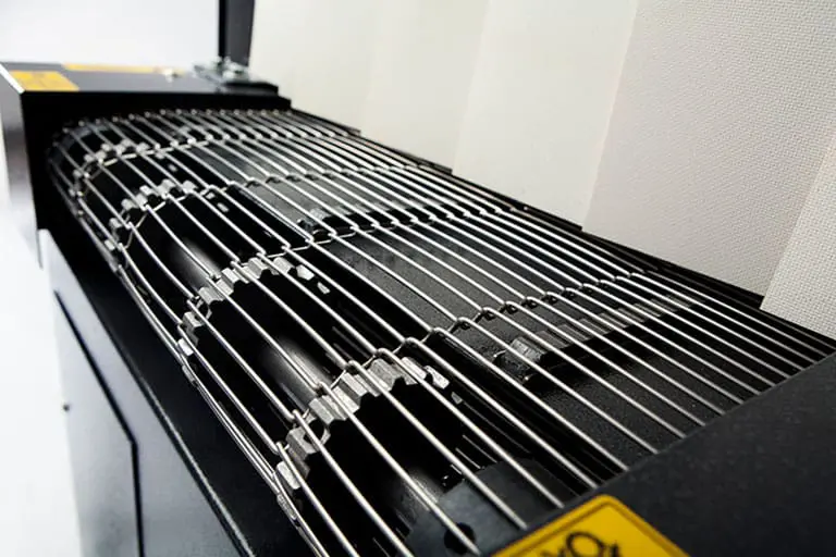 Industrial machine with metal grating detail.