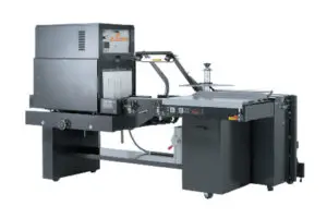 Industrial packaging machine with conveyor and controls.
