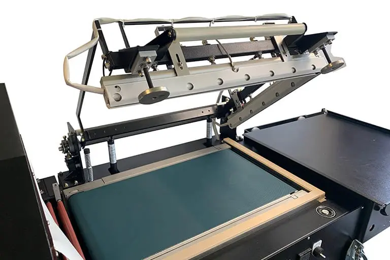 Screen printing machine with open frame.
