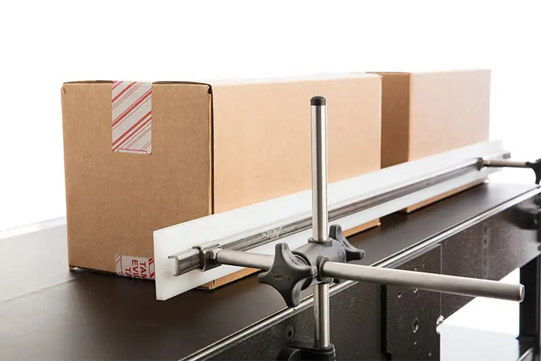 Cardboard boxes on a conveyor belt.