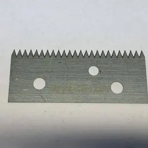 Serrated utility blade with holes, Made in USA.