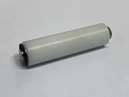 White cylindrical roller on a plain background.