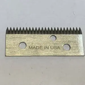 Metal blade with serrated edge, "Made in USA.