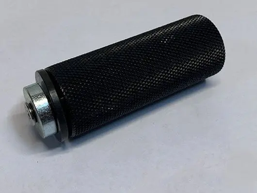 Black textured cylindrical handle with metal end.