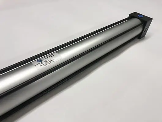 Silver industrial pneumatic cylinder.
