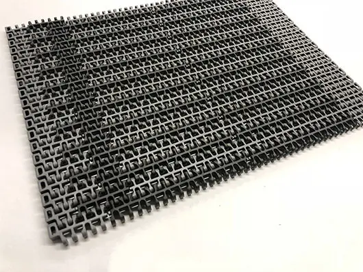 Gray plastic conveyor belt mesh.
