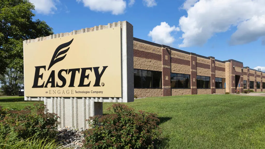 Eastey building and sign with blue sky.