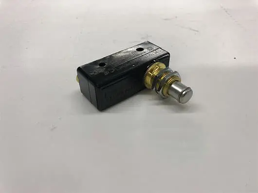 Push button switch on white background.