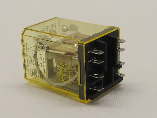 Rectangular electrical relay with yellow casing.