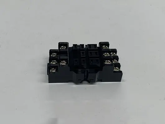 Black relay terminal block connector.