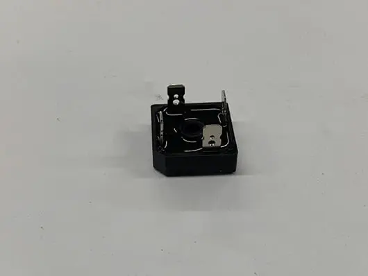 Black electronic component, single-phase diode.