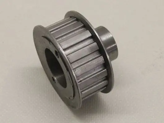 Metal gear pulley on white background.