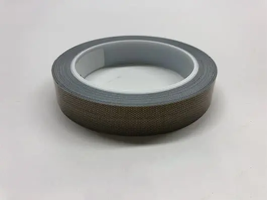 Roll of adhesive tape on white background.