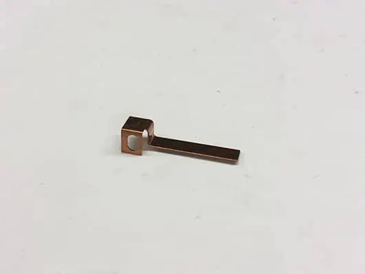 Copper electrical connector terminal.