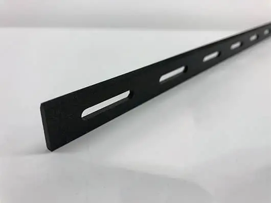 Black metal strip with mounting holes.