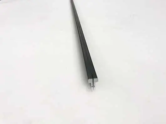 Black metal strip on white background.