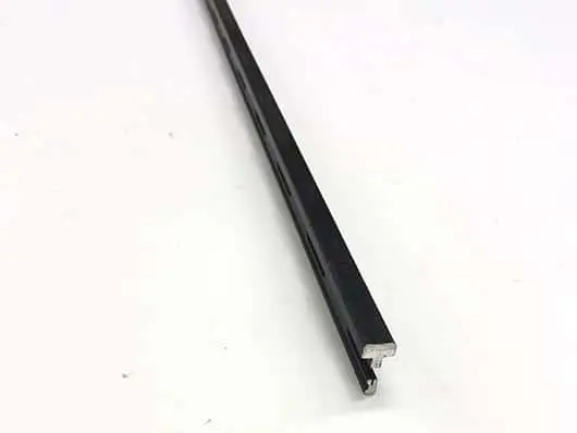 Black metal strip on white background.