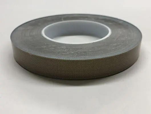 Roll of adhesive tape on white background.