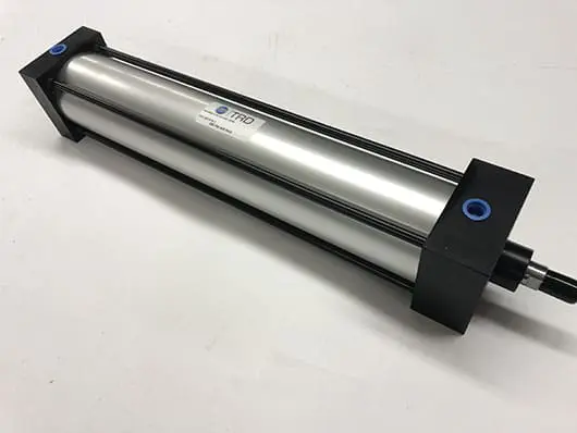 Silver industrial hydraulic cylinder.