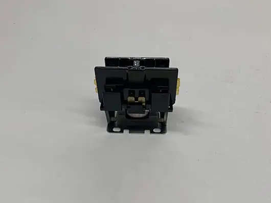 Black electrical switch on a white background.