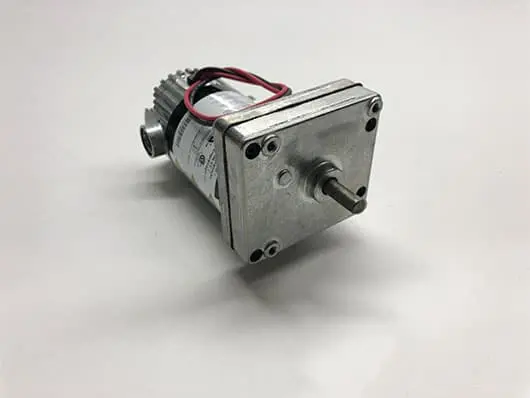 Here's an alt tag for the image: Gear motor with wires and shaft.