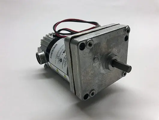 Industrial electric motor with wires and shaft.