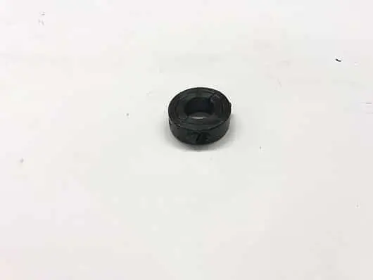 Black circular industrial component.