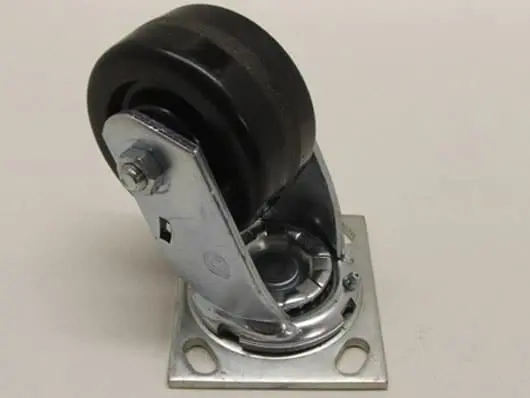 Swivel caster wheel with metal mounting plate.