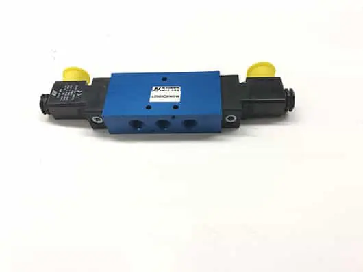 Blue pneumatic valve with four ports.