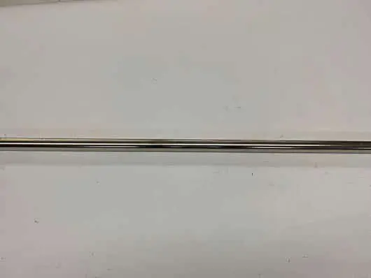 Here's an alt tag for the image: Chrome metal bar.