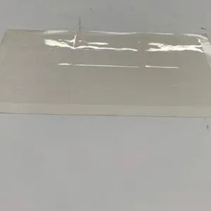 Clear adhesive sheet with grid.