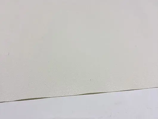White textured paper on flat surface.