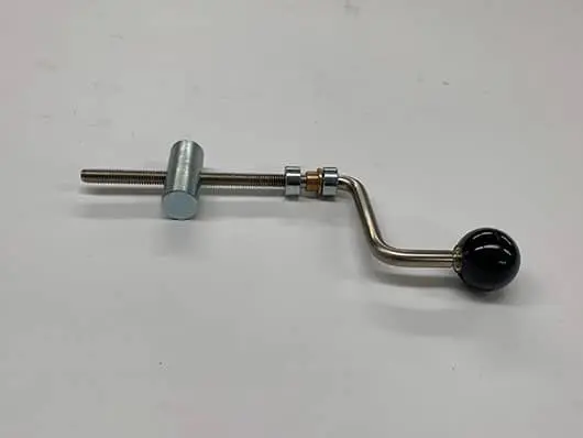 Metal crank handle with black knob.