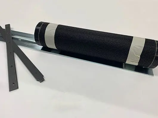 Rolled mesh fabric with cutting guides.