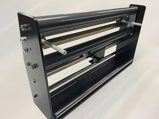 Metal machine roller with adjustable components.