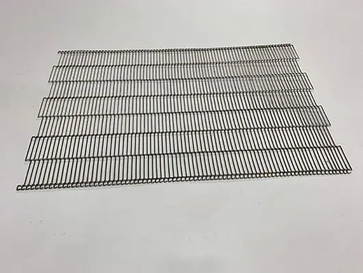 Metal wire cooling rack on white background.