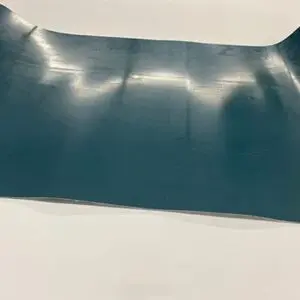 Curved blue sheet on white background.