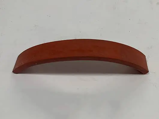 Here's an alt tag for the image: Red rubber curved strip.
