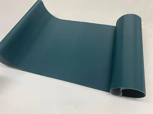 Teal vinyl roll; fabric sample.