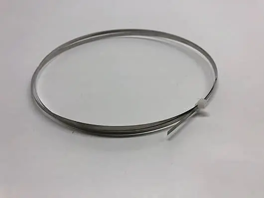 Silver metal banding strip coil.