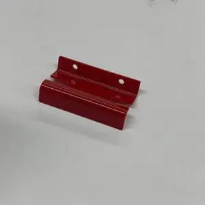Red metal brackets with holes.