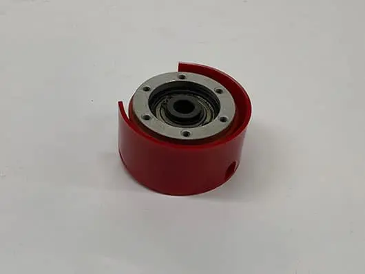 Red-cased mechanical part or device.