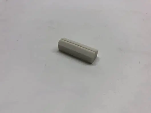 White rectangular plastic component.