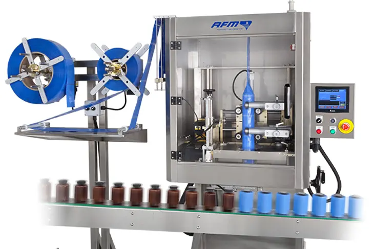 Automated packaging machine with conveyor system.